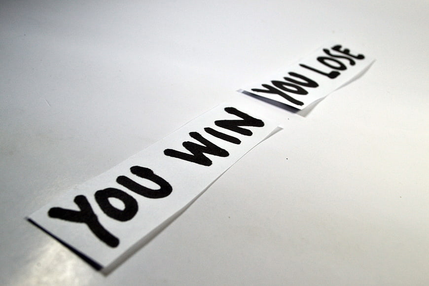 You Win You Lose Paper Strips on White Background