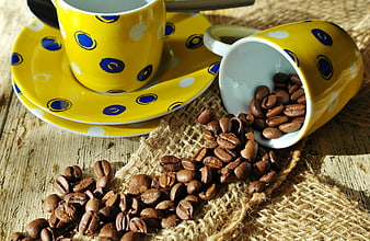 Yellow Polka Dot Coffee Cups with Spilled Beans