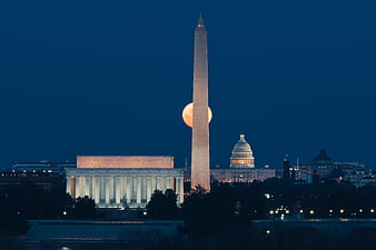 Full Moon Rising Behind Washington Monument at Night