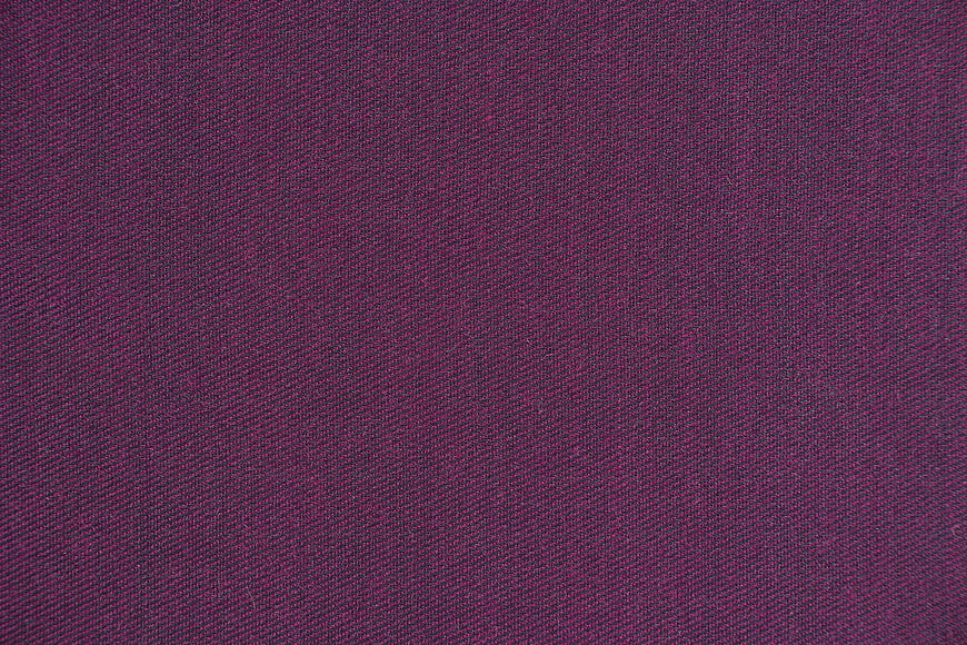 Close-up texture of purple woven fabric background