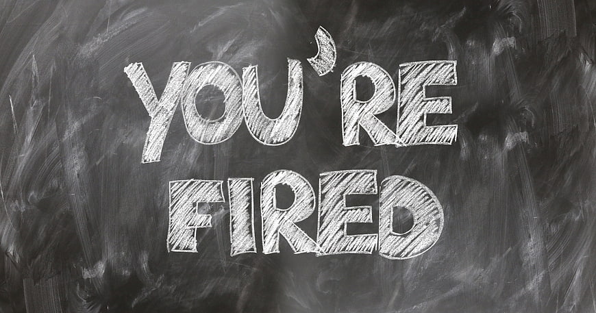 You're Fired Chalk Text On Blackboard