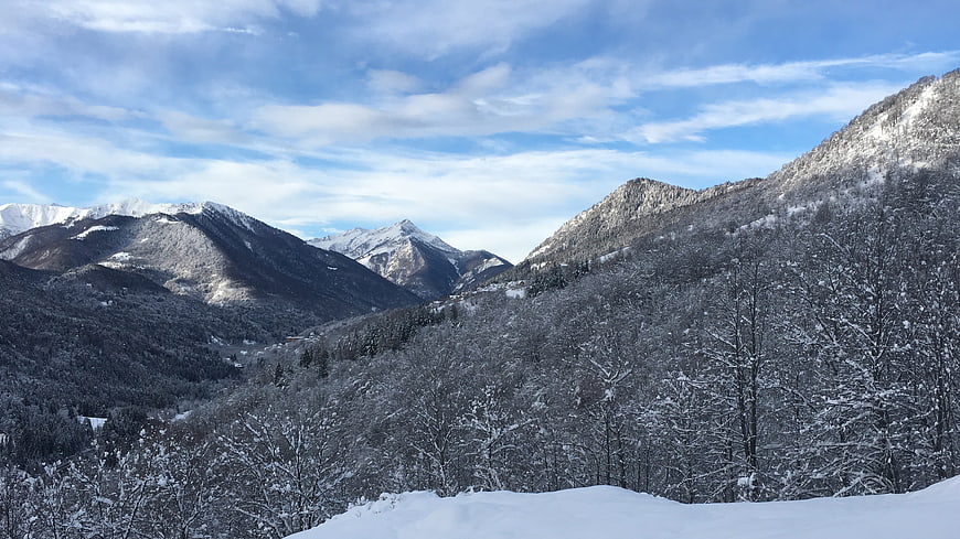 Snow-Covered Mountain Landscape with Blue Sky