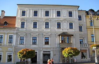 Historic white building facade in Banska Bystrica, Slovakia