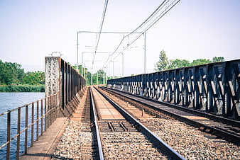 Railway tracks on steel bridge over river