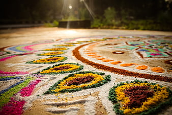 Traditional Indian Rangoli Floor Art With Vibrant Colored Powders