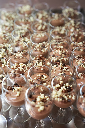 Chocolate mousse desserts in glasses with chocolate chips