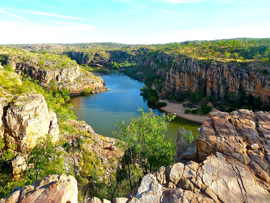 Scenic Canyon River Landscape With Rocky Cliffs And Green Vegetation