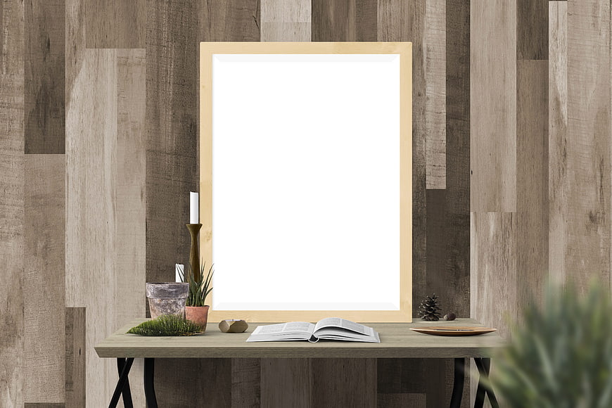 Wooden Picture Frame Mockup on Desk with Book and Plants