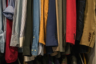 Colorful Men's Clothing Hanging on Rack