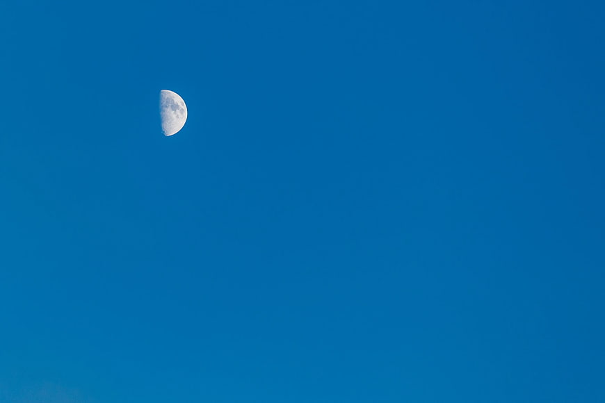 Half Moon in Clear Blue Sky