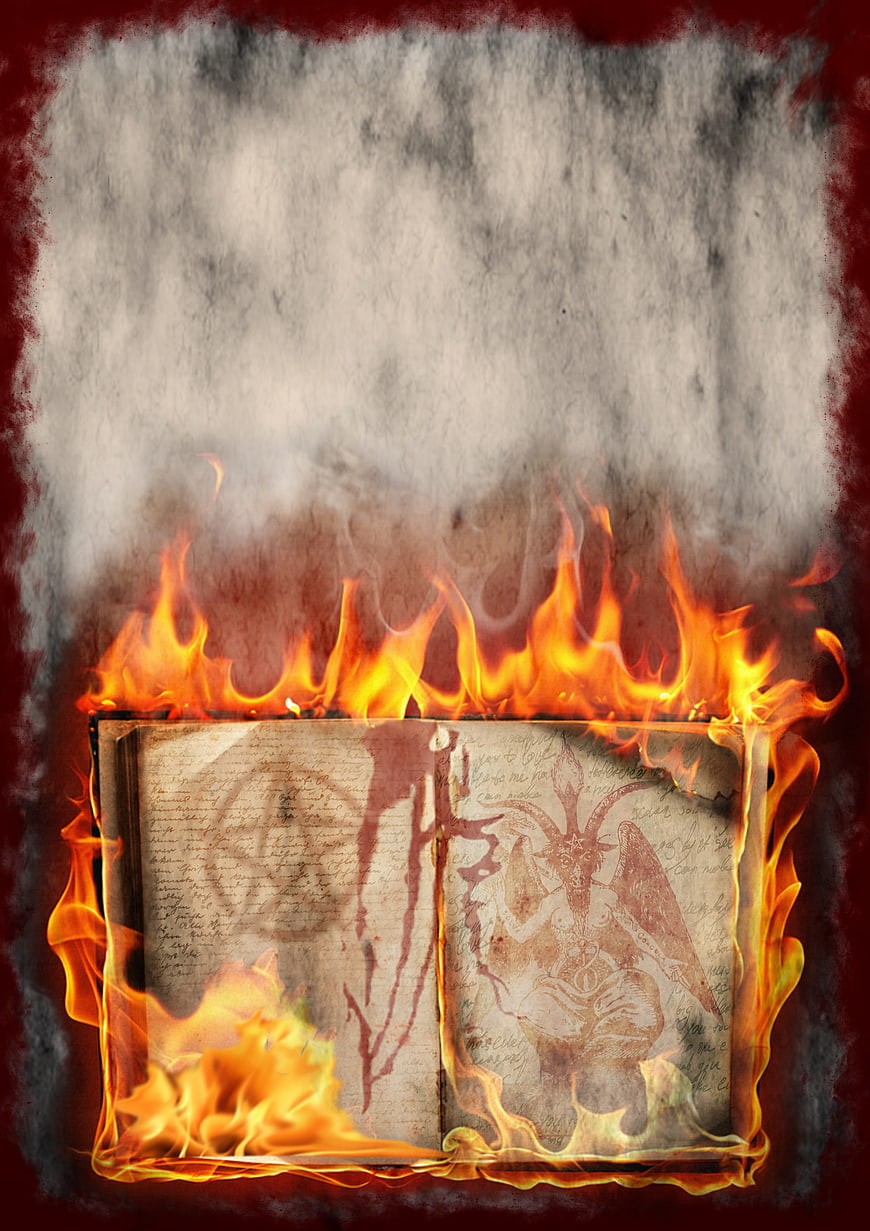 Burning Occult Book with Baphomet Illustration and Smoke