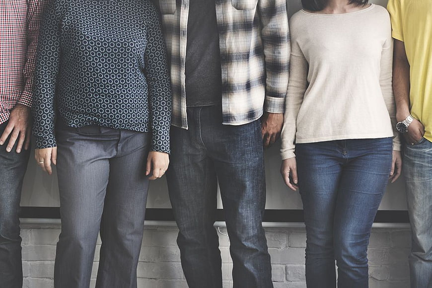 Group of friends standing together casual fashion
