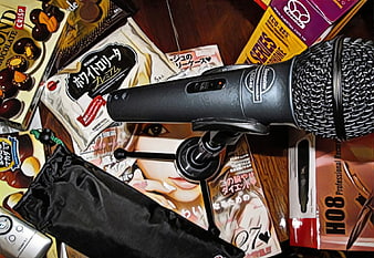Karaoke Microphone on Japanese Snacks and Magazine