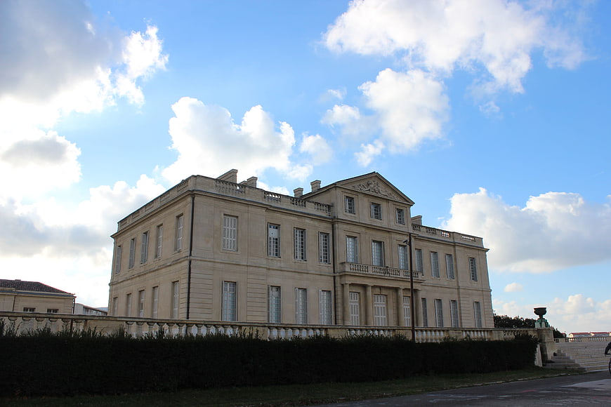 Grand Classical Chateau Facade Under Blue Sky