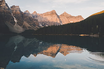 Serene Mountain Lake Reflection at Golden Hour