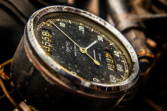 Vintage Smiths Stopwatch Close-Up on Vintage Motorcycle