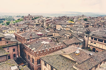 Aerial view of historic Italian town rooftops and architecture