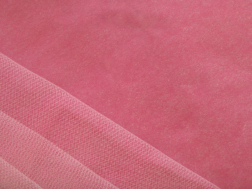 Pink textured paper background with mesh overlay