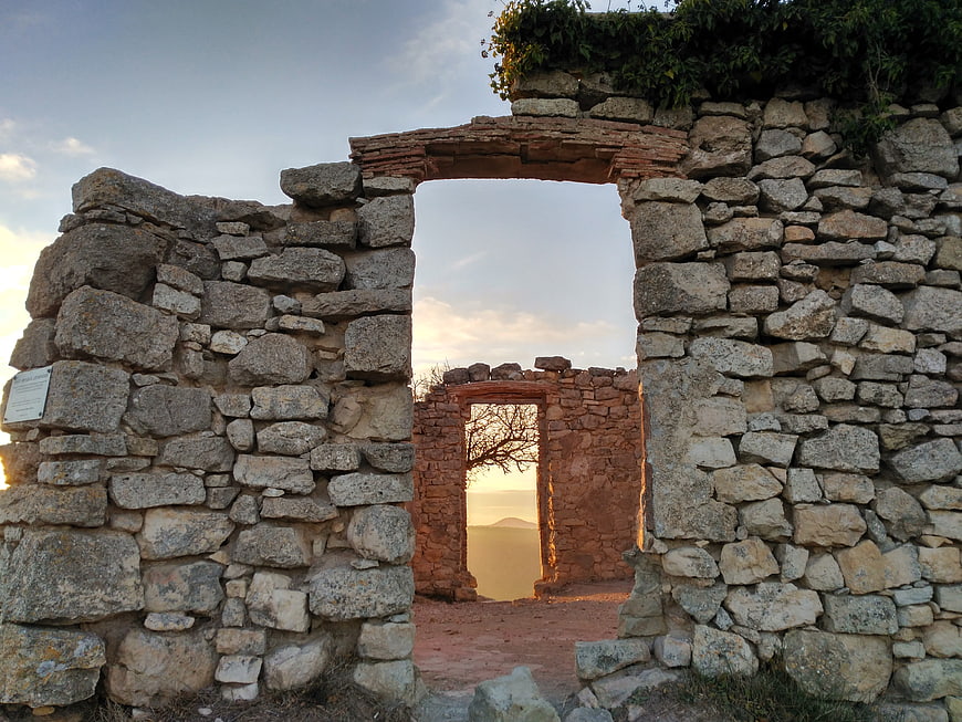 Ancient stone ruins with sunset view through doorways