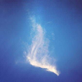 White Wispy Cloud in Blue Sky