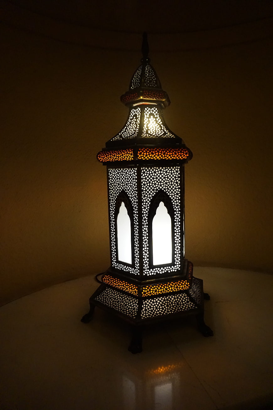Illuminated Moroccan Lantern with Intricate Metalwork