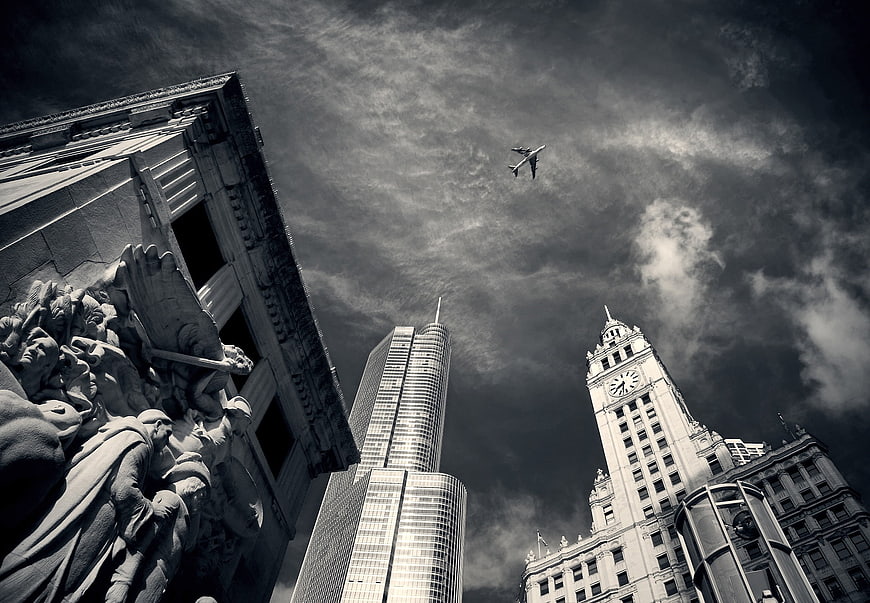 Dramatic Black and White Chicago Skyline with Airplane