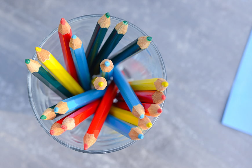 Top View of Colorful Pencils in Glass Cup