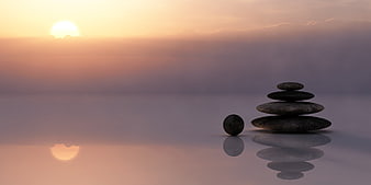 Zen Stone Stack Reflection at Sunset
