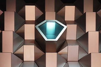 Modern geometric copper facade with hexagonal skylight