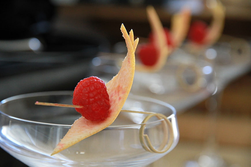 Cocktail Garnish with Raspberry and Citrus Peel