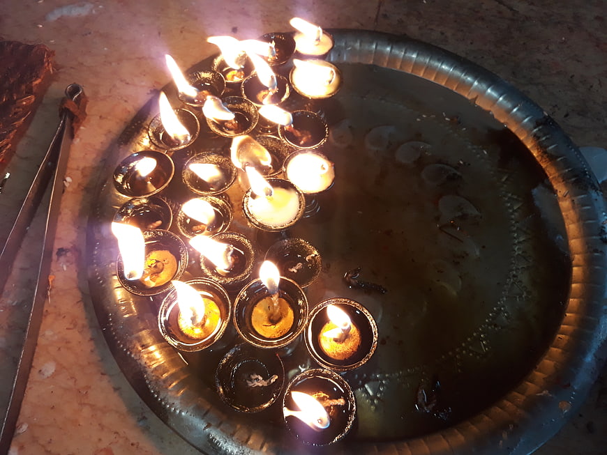 Traditional Nepali Diyo Oil Lamps in Metal Bowl