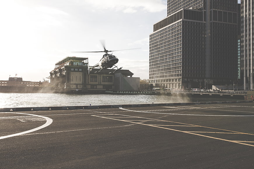 Helicopter Landing on Urban Waterfront Helipad