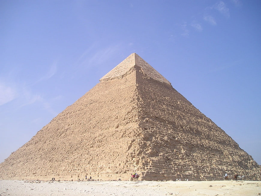 Pyramid of Khafre in Giza, Egypt with tourists and camels