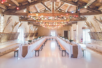 Rustic Barn Wedding Banquet Hall With Long Tables And String Lights