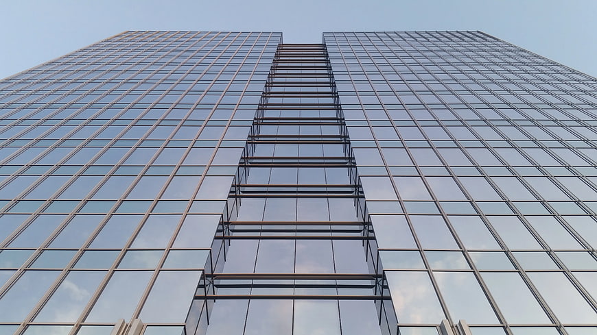 Worm's Eye View of Modern Glass Skyscraper Facade