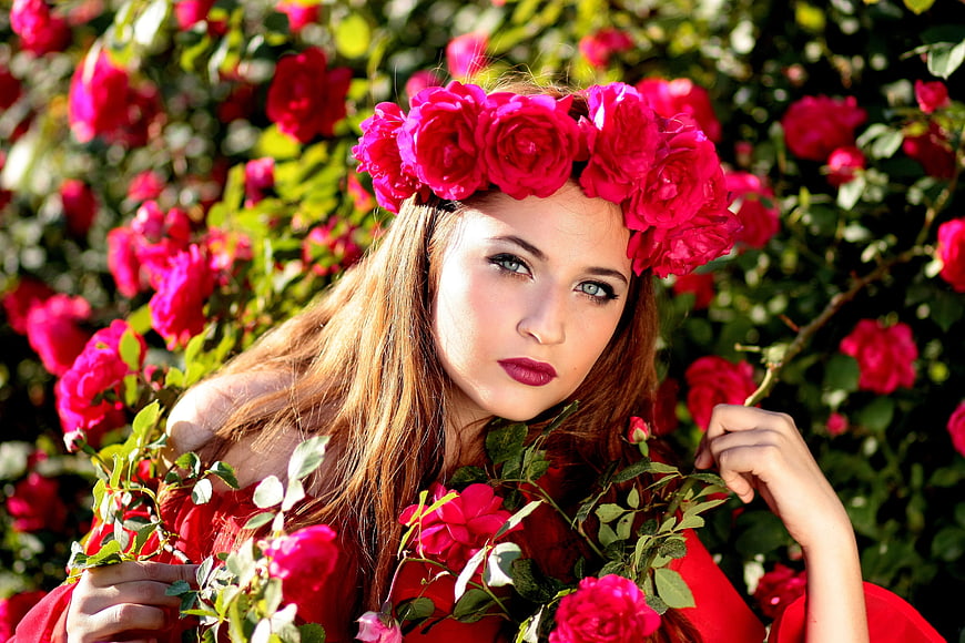 Woman with Red Rose Crown in Garden