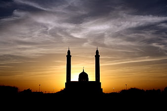 Mosque Silhouette Against Dramatic Sunset Sky