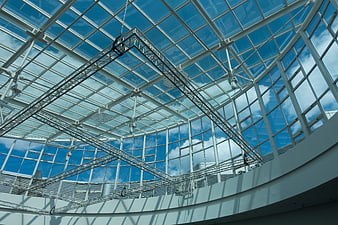 Modern Glass Atrium with Metal Truss Structure