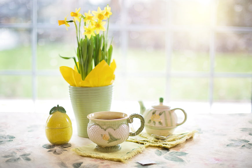 Spring tea time with daffodils and lemon sugar bowl