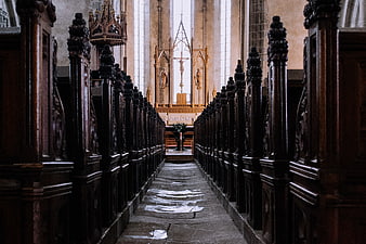 Gothic Church Interior with Wooden Pews and Altar