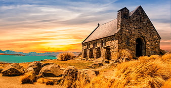 Stone Church by Turquoise Lake at Sunset