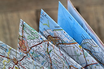 Folded paper road map with city names and routes