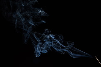 Abstract Blue Smoke Swirls on Black Background