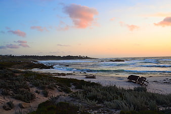 Serene Sunset at Pacific Grove Beach with Wooden Benches