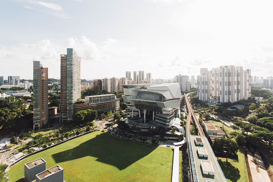 Aerial View of Modern City Architecture with Green Spaces