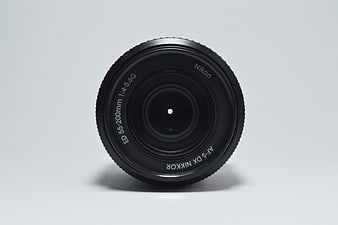 Black Nikon Camera Lens Isolated on White Background
