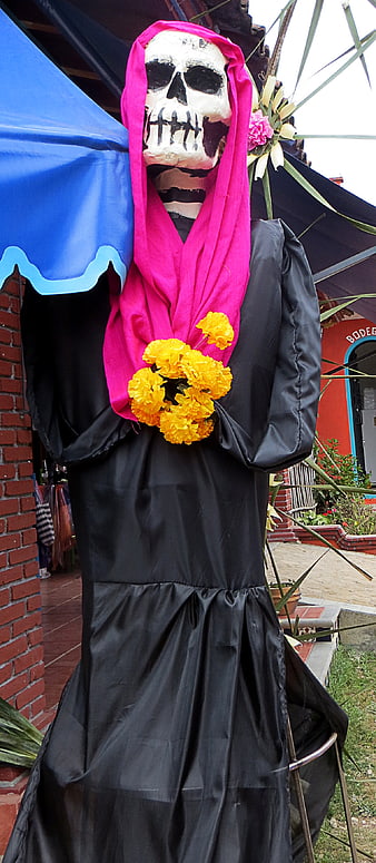 Day of the Dead Skeleton Figure with Marigolds