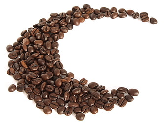 Coffee beans arranged in a crescent shape on white background
