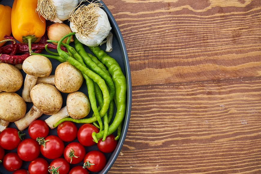 Fresh Vegetables on Wooden Table with Copy Space