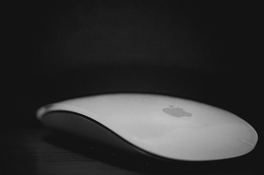 White Apple Magic Mouse on Dark Background